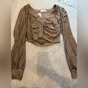 Vestique top
Size Medium